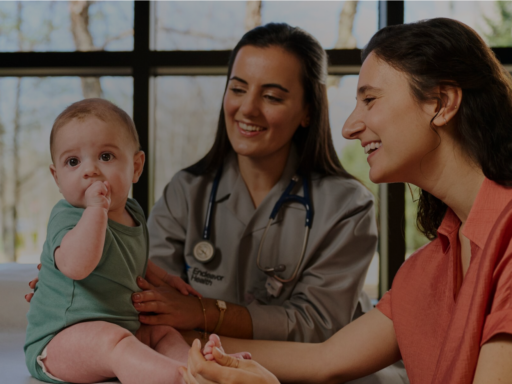 Endeavor Health - Baby with clinician and mother